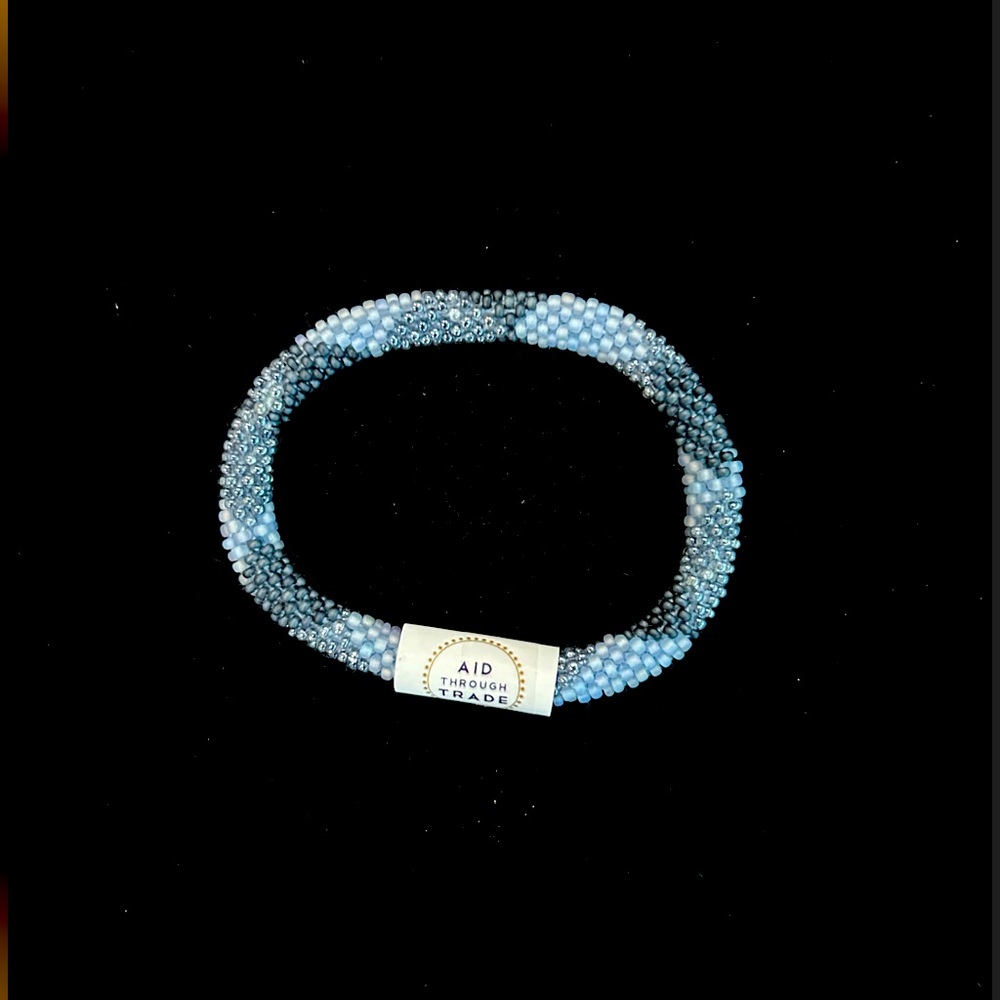 Aid through Trade. Gray blue denim color. Handmade in Nepal the original roll